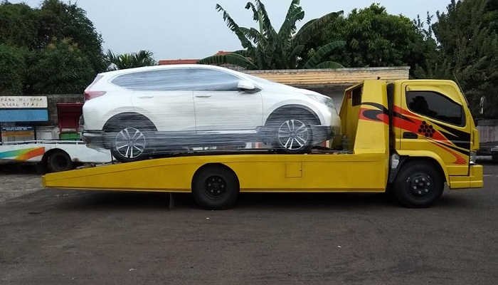 Kirim mobil via towing